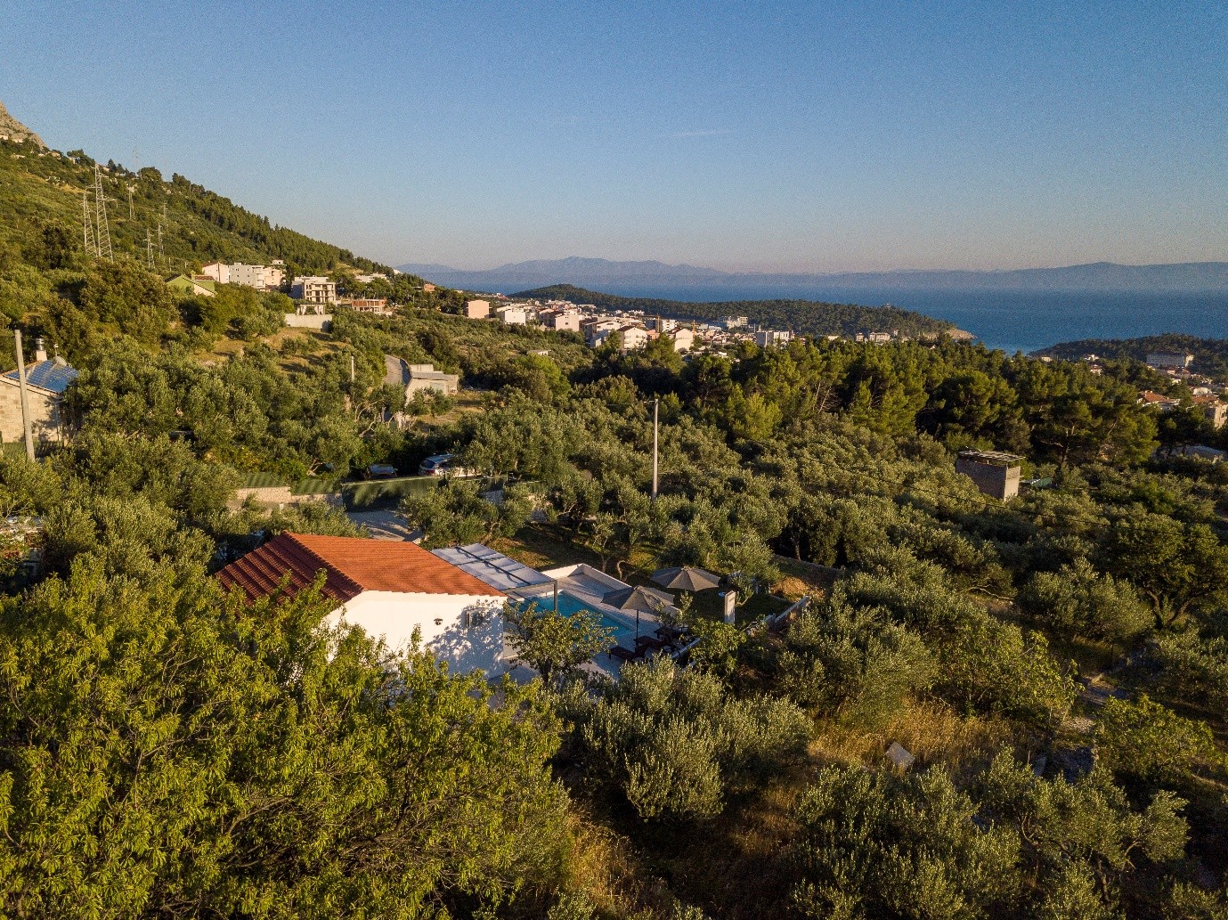 Aerial view of Olive Lounge House above the Makarska coast